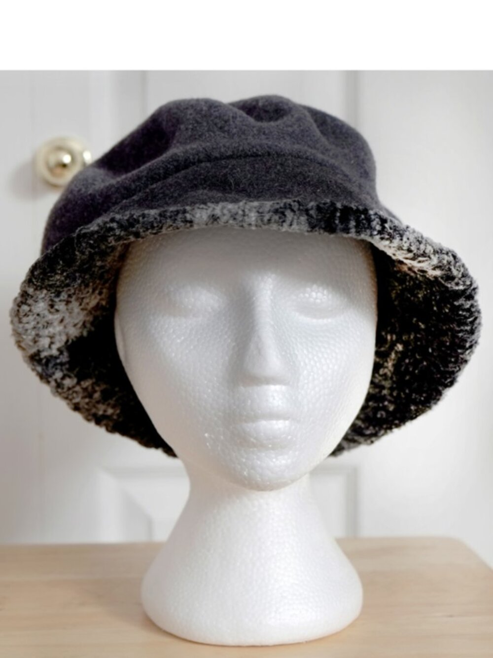 Grey Création Almar bucket hat with faux Persian lamb brim